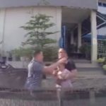 pengemudi-pemukul-pria-gendong-bayi